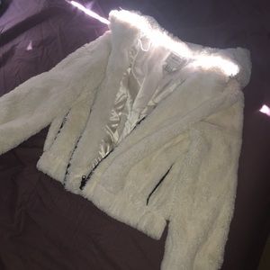 fluffy white zip up